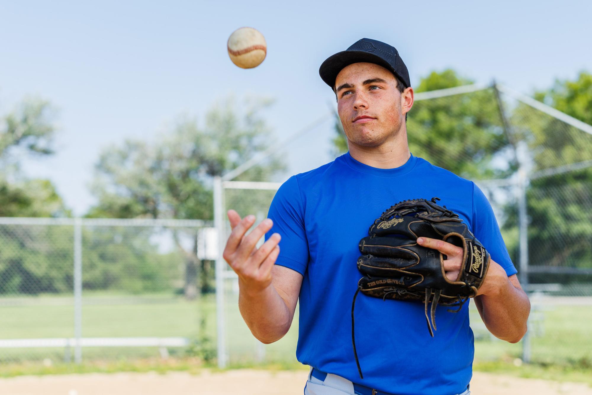 Mason tossing baseball