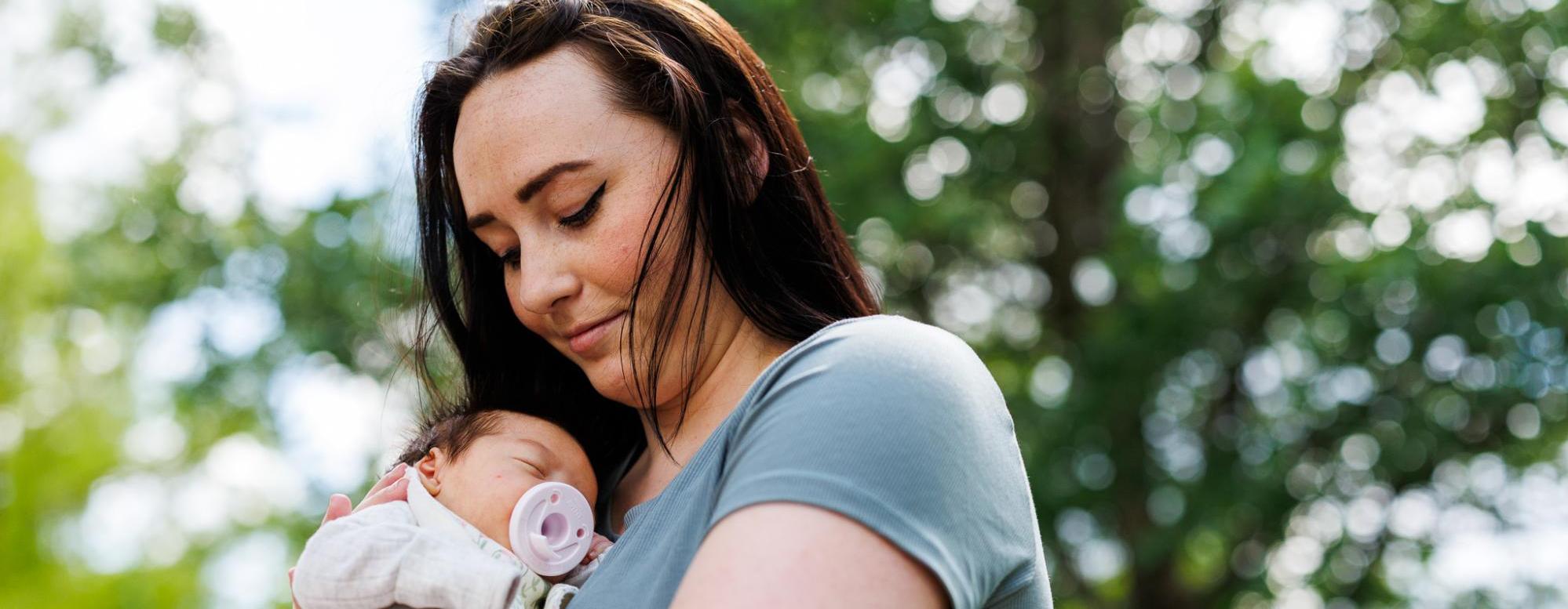 Woman holding her baby